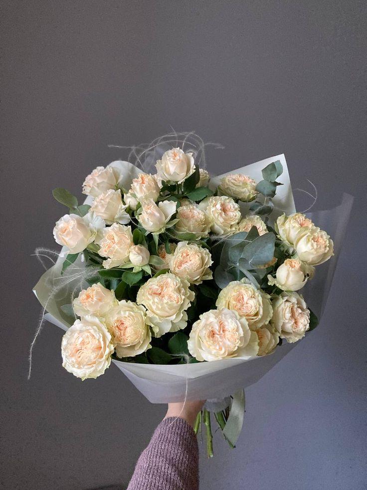 Corporate meeting room with carefully timed floral arrangements that maintain elegance throughout business hours